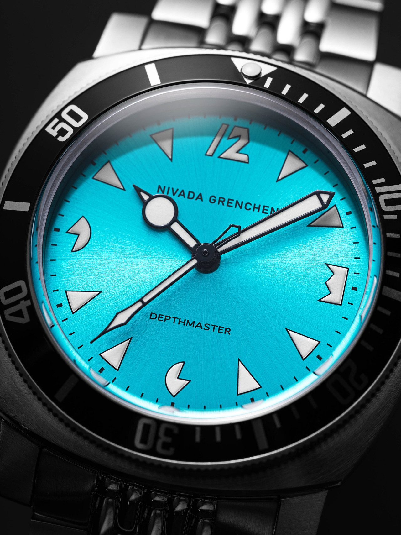 Macro of the sunray Caribbean blue dial