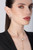 Pasquale Bruni Petit Garden Libellule earrings in 18k white and rose gold with white and champagne diamonds, ref. 16715BR, at Little Europe Jewellers St. Maarten (worn or styled)