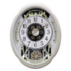 Moving Face Pendulum Wall Clock - Plays Melodies Every Hour