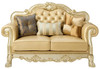 64" Bone And Gold Faux Leather Loveseat and Toss Pillows