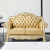 64" Bone And Gold Faux Leather Loveseat and Toss Pillows
