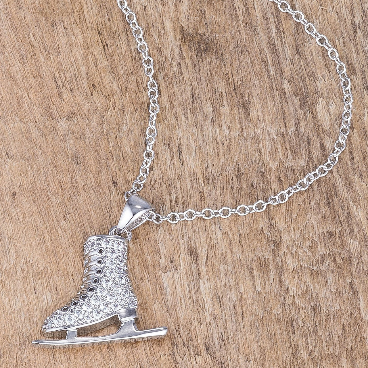 Delicate .4Ct Rhodium Plated Ice Skate Pendant