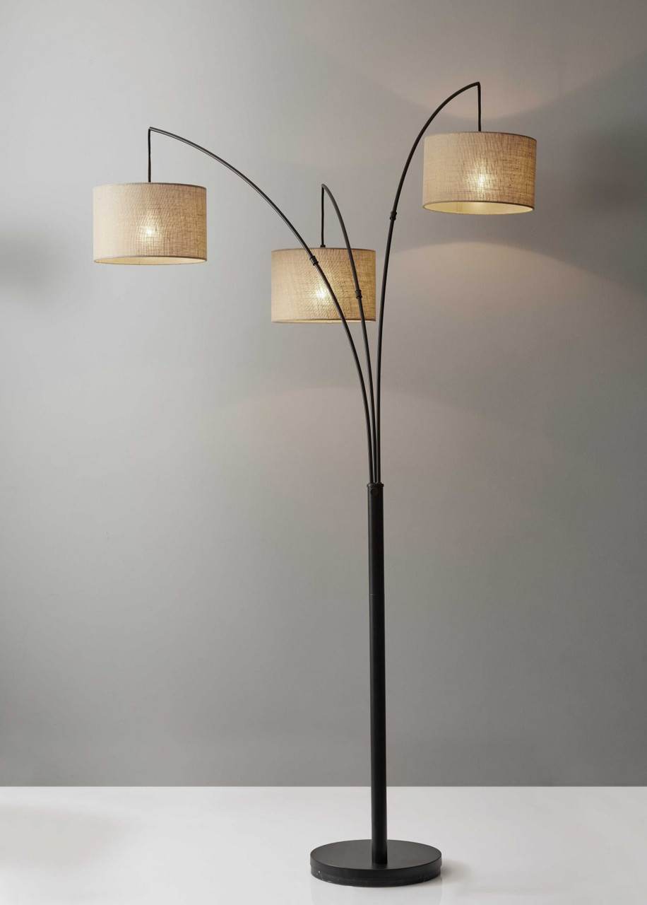 74" Antiqued Black Metal Three Light Tree Floor Lamp With Beige Fabric Drum Shades