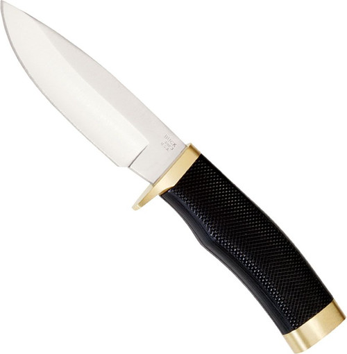 Detail shot of Buck Vanguard blade and handle showing "BUCK USA" engraving mark, polished steel finish, brass guard placement, and detailed black rubber handle texture pattern.