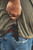 (Waistband Draw - Kydex Sheath) TOPS El Pionero drawn from black Kydex sheath tucked in waistband | Concealed appendix carry with jeans and olive shirt | Ed Calderon tactical fixed blade everyday carry setup