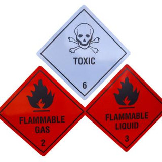 Three warning signs showing different chemical and dangerous goods.
