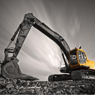 Excavator on rocks