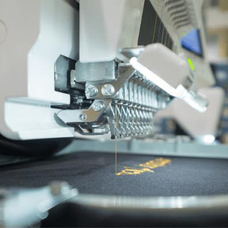 Embroidery machine in operation.