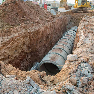 Concrete drainage pipe on a construction site