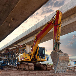 Excavator machine at road construction of expressway under construction