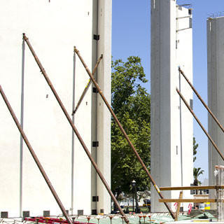 A large new building is constructed using tilt-up concrete panels.