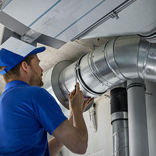 HVAC worker install ducted pipe system for ventilation and air conditioning.