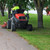 Council workers moving and maintaining the park grounds.