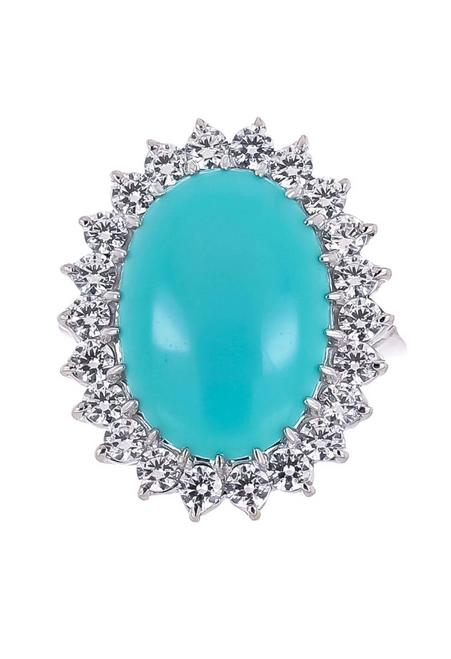 15ct Oval Cut Center surrounded by 22 Round Cut stones of 1.3ct.