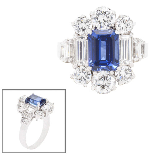 1.5ct Emerald Cut Center with 6 Round Cut Stones of 1.7 TCW on the Top and Bottom  and 6 Baguette Cut of 1.1 TCW on the sides. E65R-SAP-CZ-14K