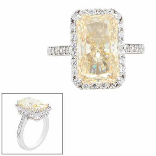 14 X 8.5 NARROW EMERALD CUT RING WITH STONES AROUND AND FILAGREE