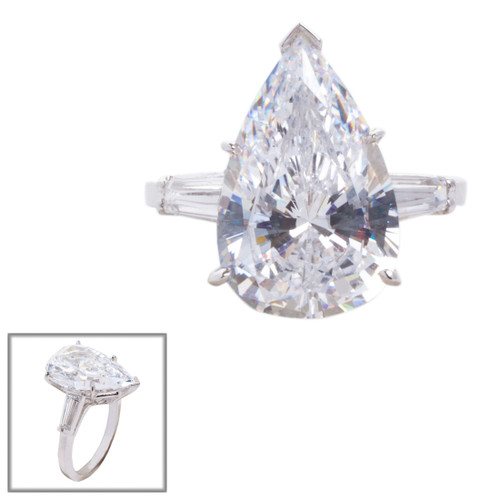 8ct Pear-shape Center Ring  with .50ct Baguettes on the sides. Center stone size: 17x11mm.