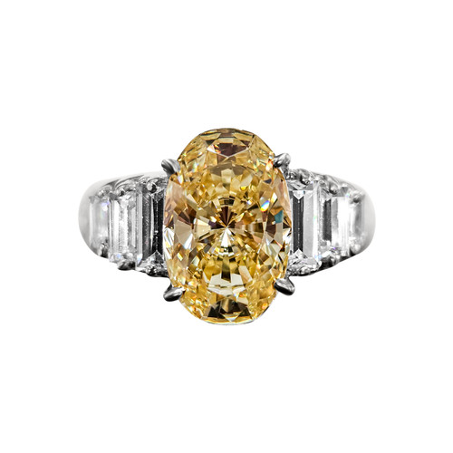 Wide Shank 3.25ct Oval Cut Center  with 3 Step Baguette Cut on each side of .75ct. Center stone size: 12x7.75mm