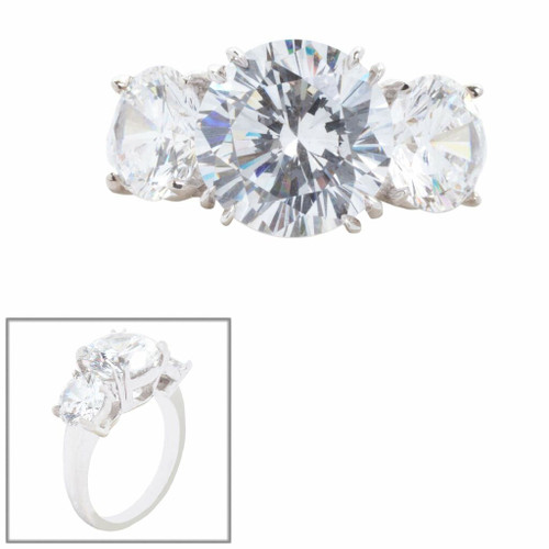 3 STONE OF ROUNDS 4cts center  1.25cts side stones