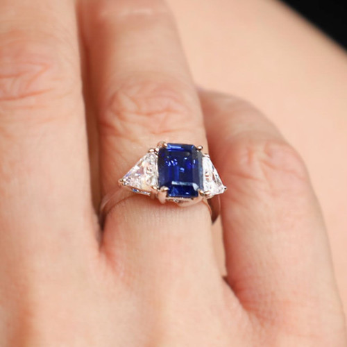 2.5ct Emerald Cut Center with 2 Trillion Cut stones of 1.1ct on the sideS