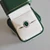 2.5ct oval ctr. surr. by 10 rds.  T13092-EM-CZ-14K