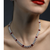 Pear Stone Necklace with Ruby Highlights