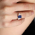 2.5ct Emerald Cut Center with 2 Trillion Cut stones of 1.1ct on the sideS