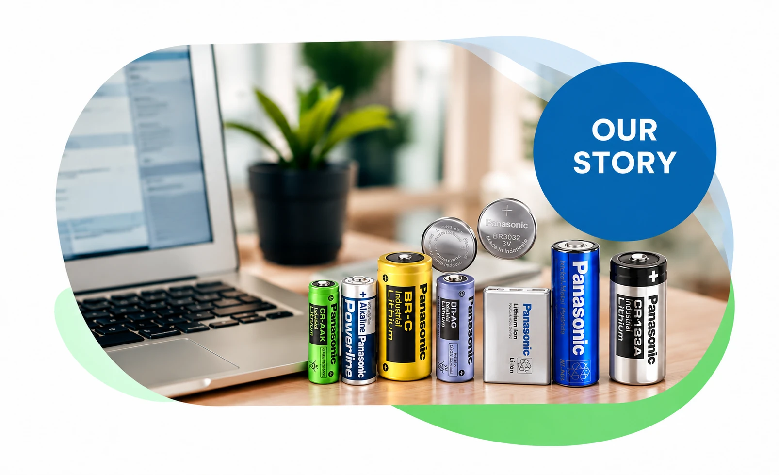 Panasonic battery assortment beside a laptop, illustrating the OnlyBatteries company story