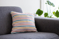 Designer pillow for interior decoration with natural pigments Indigo, Pink, Lilac, and Yellow