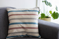 Interior design pillow with natural dyes in a sofa