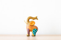 Wood carved yellow elephant Alebrije