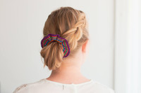 Gorgeous girl wearing a colourful handmade scrunchie.