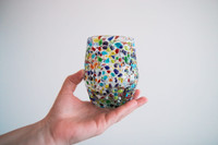 Hand-blown glass with playful coloured dots. A fun item to decorate your table and to give it a cozy touch.