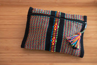 Beautiful pouch with unique patterns was made by hand using a waist loom. 
It is the perfect accessory for your cards, bills, coins, keys, or medium items. It can be used as a toiletry bag. With its ideal size, you can easily carry it on hand. Pouch colourful black