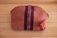 Beautiful pouch with unique patterns was made by hand using a waist loom. 
It is the perfect accessory for your cards, bills, coins, keys, or medium items. It can be used as a toiletry bag. With its ideal size, you can easily carry it on hand. Pouch autumn brown