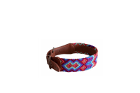 Handmade collar with colourful patterns woven by hand by artisans in Mexico. Handmade collar with colourful patterns woven by hand by artisans in Mexico.
Your furry friend will love this beautiful and unique collar. Large dog collar brown, red, purple, blue