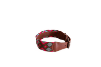 Handmade collar with colourful patterns woven by hand by artisans in Mexico. Handmade collar with colourful patterns woven by hand by artisans in Mexico.
Your furry friend will love this beautiful and unique collar. Large dog collar brown, pink, aqua, blue