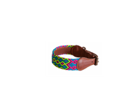 Handmade collar with colourful patterns woven by hand by artisans in Mexico. Handmade collar with colourful patterns woven by hand by artisans in Mexico.
Your furry friend will love this beautiful and unique collar. Medium dog collar green, blue, yellow