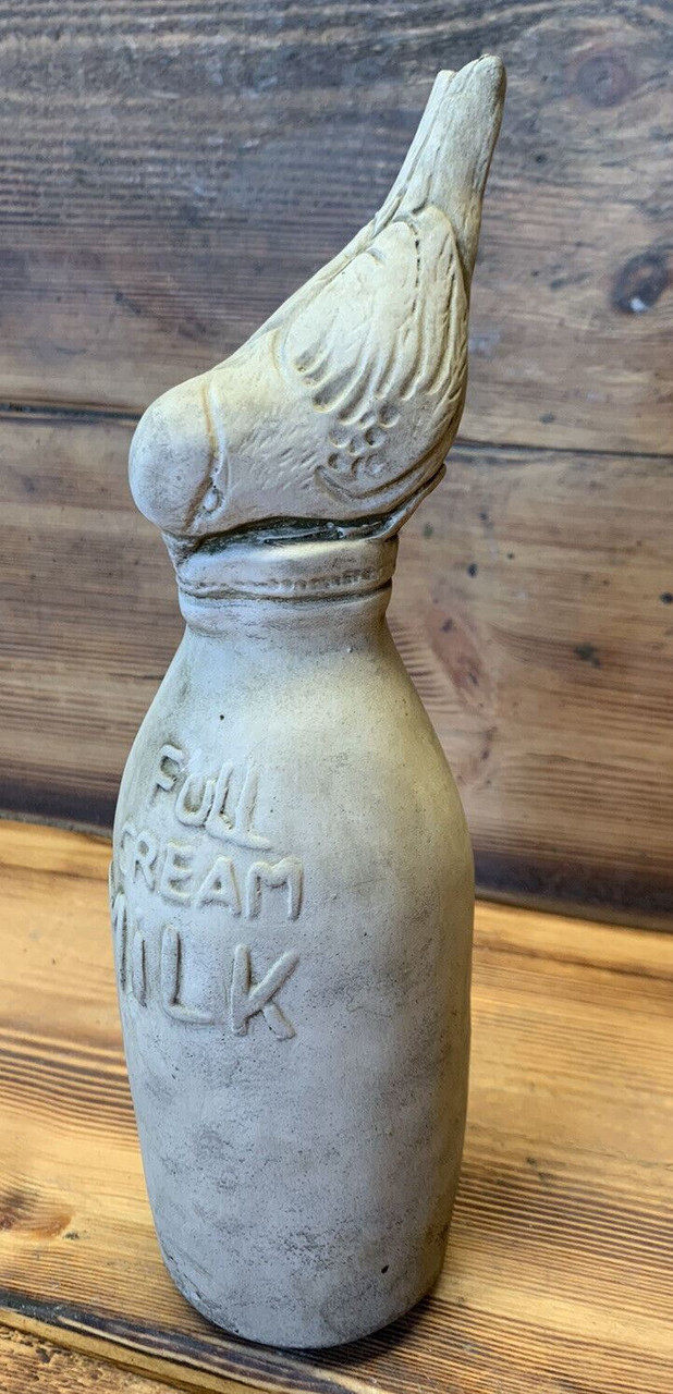 STONE GARDEN BIRD ON A MILK BOTTLE STATUE ORNAMENT