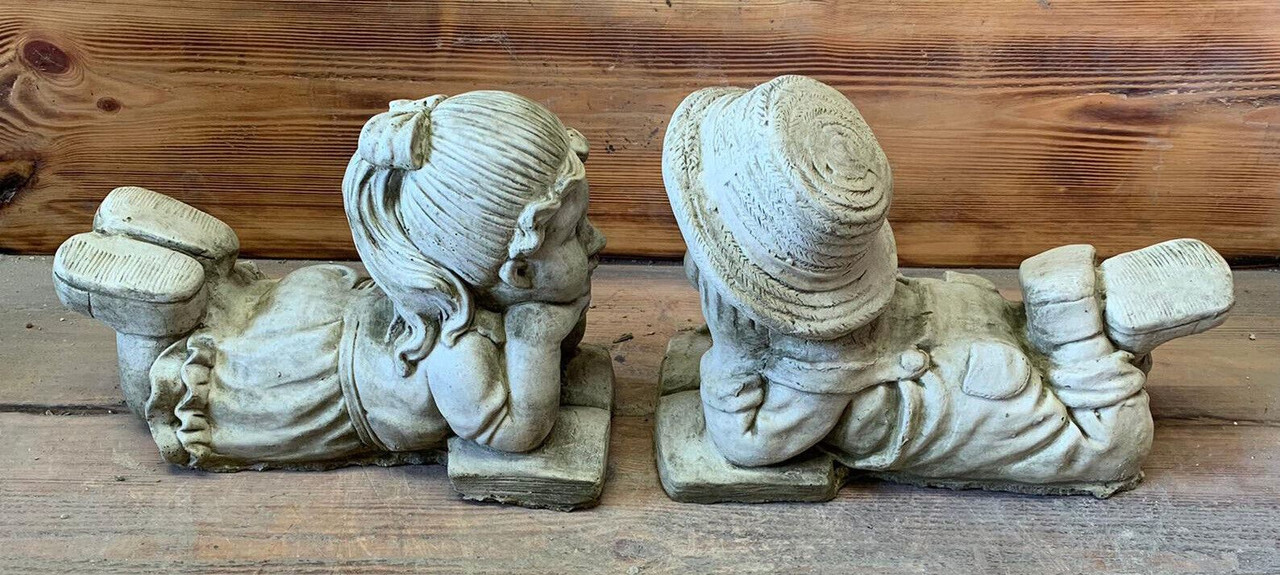 STONE GARDEN PAIR OF LAYING BOY AND GIRL STATUE ORNAMENTS