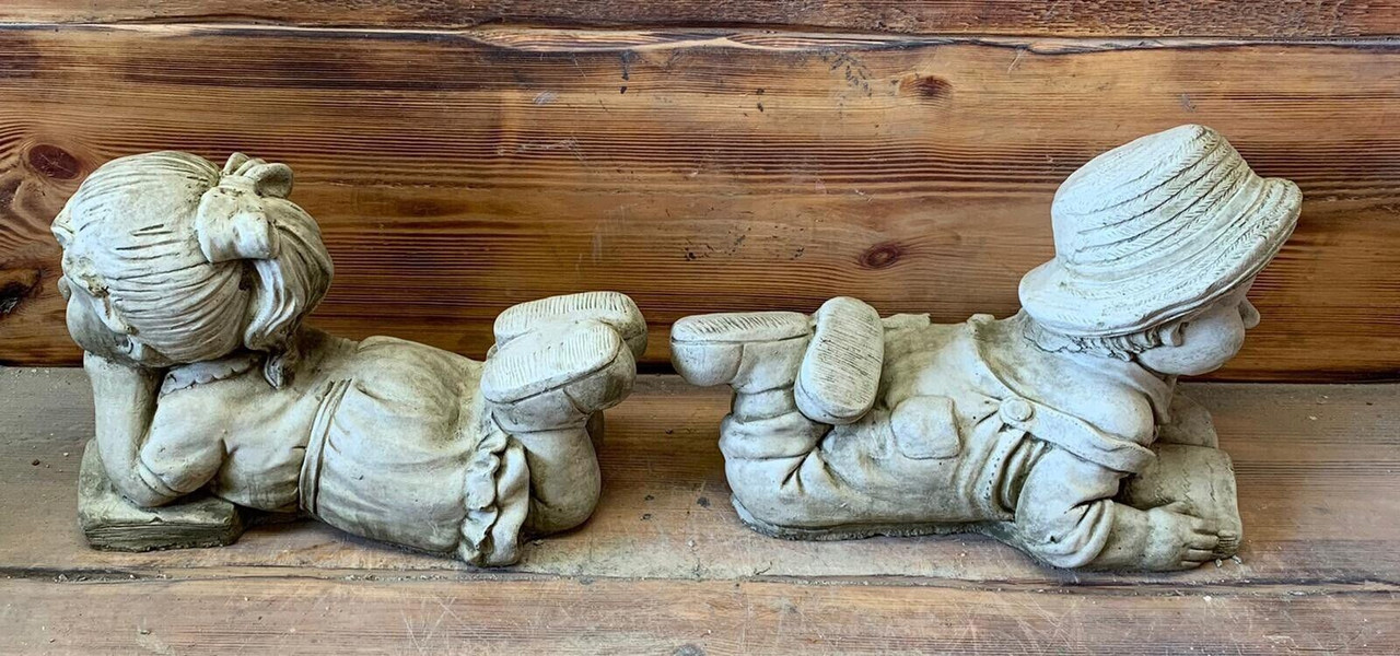 STONE GARDEN PAIR OF LAYING BOY AND GIRL STATUE ORNAMENTS