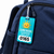 Backpack badge attachment example with sun mascot and 2026–2027 school year