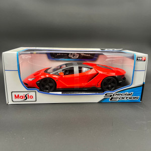 Side view of Maisto Special Edition of a Lamborghini Centenario Orange with Matte Black Top in 1:18 scale Side view of Maisto Special Edition of a Lamborghini Centenario Orange with Matte Black Top in 1:18 scale