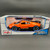 Side view of Maisto Special Edition of Bugatti Divo in 1:18 scale in the color orange