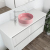 Matte pink round above counter basin