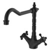 Matte black shepherds crook spout with attached cross handle taps.