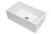 Large, white butlers sink with rounded external corners.