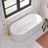 Eleanor Fluted Freestanding Acrylic Bath pictured with a brushed brass floor standing spout with wall mounted mixer - pictured from above.