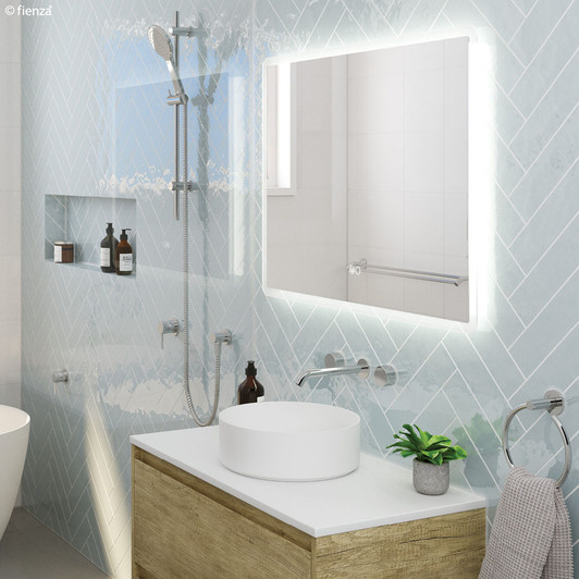 Chrome fixed bath outlet or basin spout with round disk taps.