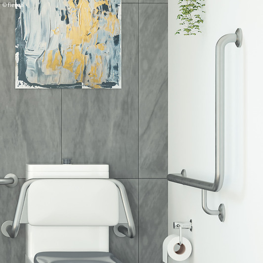 Angled stainless steel round grab rail. Pictured beside a toilet fitted with a back rest. Angled stainless steel round grab rail. Pictured beside a toilet fitted with a back rest.
